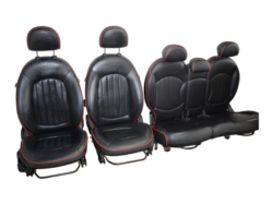 Countryman R60-stoelen, volledig leer, rode bies
